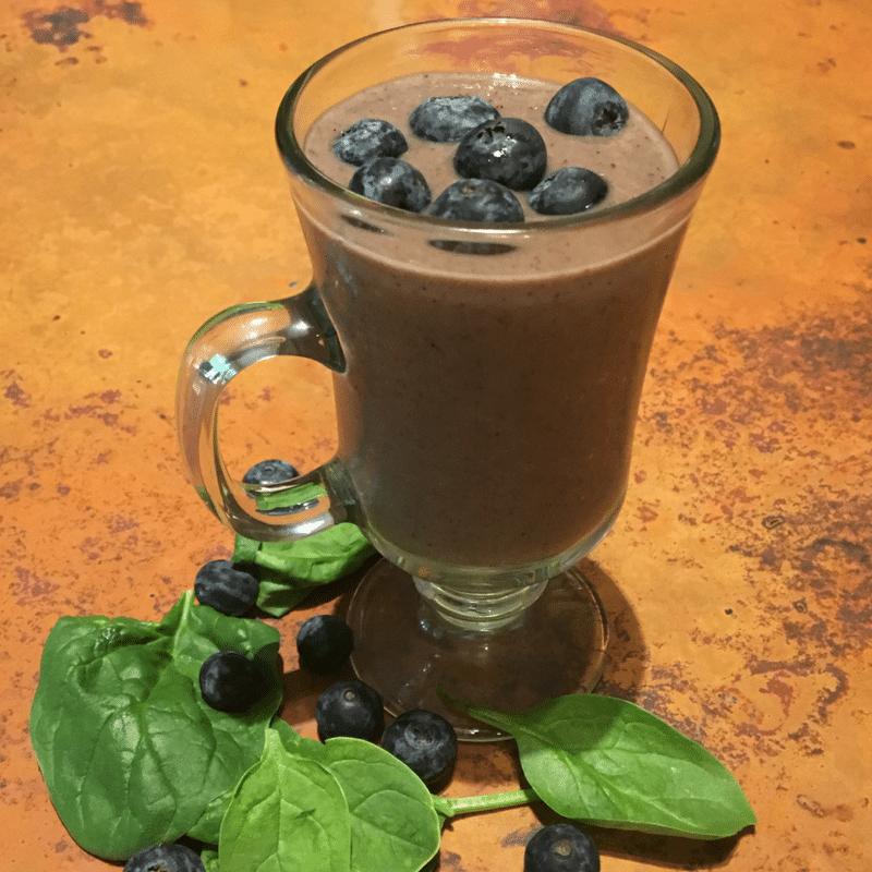 Wild Blueberries Smoothie with added greens. Beginner Green Smoothies with spinach, wild blueberries, strawberries and avocado