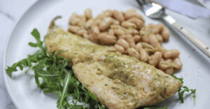 Baked White Fish with Beans in Parsley Sauce