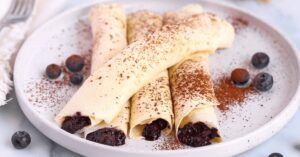 Protein Crepes with Blueberry Sauce